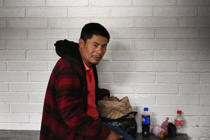 Rigoberto Miranda, 47, sits on a bench in jail after being arrested at court in Guatemala City on August 21, 2024. Guatemalan police on August 21 arrested Miranda, who is wanted by the US for allegedly