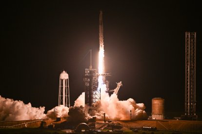 A SpaceX Falcon 9 rocket with the Crew Dragon Resilience capsule, carrying the crew of the Polaris Dawn Mission, lifts off from Launch Complex 39A at Kennedy Space Center in Cape Canaveral, Florida, on September 10, 2024. (Photo by CHANDAN KHANNA / AFP)