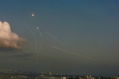 An Israeli aerial defense system launches missiles to intercept rockets fired from Lebanon