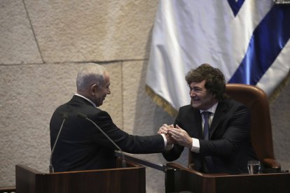 Israel's Prime Minister Benjamin Netanyahu greets Argentina's President Javier Milei in the Knesset, Israel's parliament
