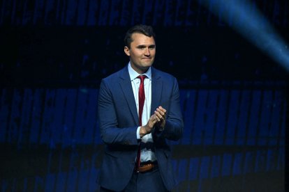 Conservative political activist and founder of Turning Point Action Charlie Kirk takes the stage during a Turning Point Action 'United for Change' campaign rally for former US President and Republican presidential candidate Donald Trump at Thomas & Mack Center in Las Vegas, Nevada, on October 24, 2024. (Photo by Patrick T. Fallon / AFP)