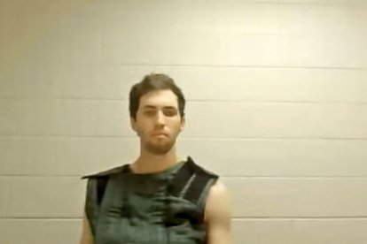This screengrab from the Utah Court live streaming shows Tyler Robinson, the suspect in the killing of political activist Charlie Kirk, attending a court appearance remotely from his jail cell in Provo, Utah, on September 16, 2025. Robinson has been formally charged with the murder of Kirk, and the prosecution added a notice of intent to seek the death penalty. Six other charges include obstruction of justice and witness tampering. Kirk, a close ally of President Donald Trump, was shot dead last week during a speaking event on a Utah university campus. (Photo by POOL / AFP)
