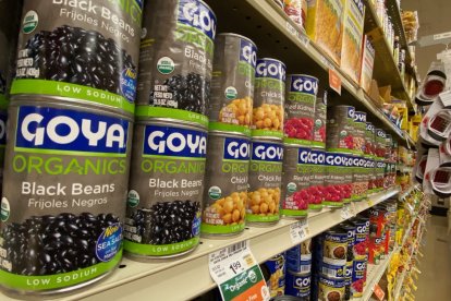 This illustration photo taken on July 11, 2020 shows a selection of Goya food products in a Los Angeles supermarket. (Photo by Chris DELMAS / AFP)