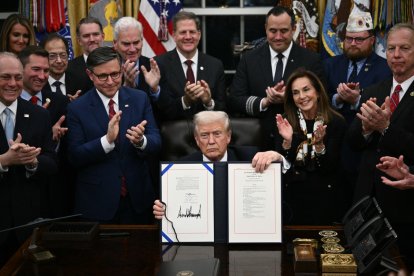 Trump displays signed bill to reopen government