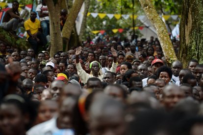 A believer reacts at Namugongo Martyrs' Shrine during an open air mass held by Pope Francis on November 28, 2015 (Archivo)
