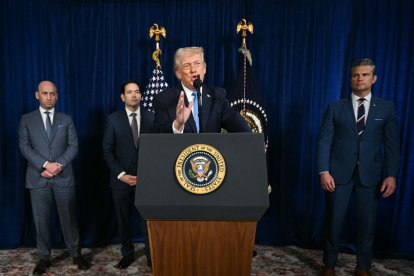 US President Donald Trump, alongside (L/R) Deputy Chief of Staff Stephen Miller, Secretary of State Marco Rubio, and US Secretary of Defense Pete Hegseth, speaks to the press following US military actions in Venezuela, at his Mar-a-Lago residence in Palm Beach, Florida, on January 3, 2026. President Trump said Saturday that US forces had captured Venezuelan leader Nicolas Maduro after launching a "large scale strike" on the South American country. (Photo by Jim WATSON / AFP)
