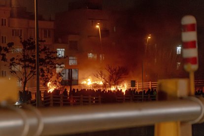Iranians gather while blocking a street during a protest in Tehran, Iran on January 9, 2026. The nationwide protests started in Tehran's Grand Bazaar against the failing economic policies in late December, which spread to universities and other cities, and included economic slogans, to political and anti-government ones.
