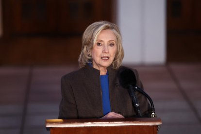 Former US Secretary of State Hillary Clinton speaks to the press after her a deposition with the House Oversight Committee as they investigate links to convicted sex offender Jeffrey Epstein, in Chappaqua, New York, on February 26, 2026. Clinton testified behind closed doors on Thursday before a congressional committee investigating the late convicted sex offender Jeffrey Epstein and his accomplice Ghislaine Maxwell. Former president Bill Clinton is scheduled to answer questions the following day from the Republican-led House Oversight Committee about his relations with Epstein, who died in a New York jail cell in 2019 while awaiting trial. (Photo by CHARLY TRIBALLEAU / AFP)