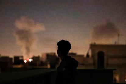 A plume of smoke rises after a strike on Tehran on March 4, 2026.