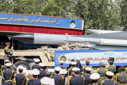 A truck carries a missile during a military parade as part of a ceremony marking the country's annual army day in Tehran (Files)