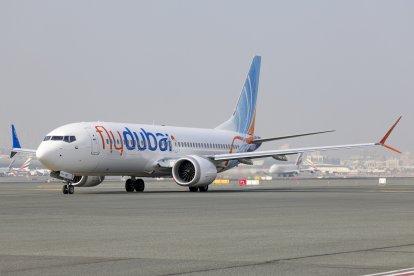 A Fly Dubai Boeing 737 Max taxis at Dubai International Airport in Dubai