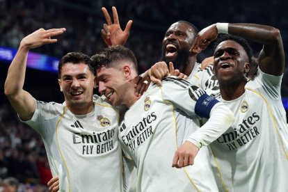Real Madrid's Uruguayan midfielder #08 Federico Valverde (2L) celebrates his third goal during the UEFA Champions League last 16 first leg football match between Real Madrid CF and Manchester City at Santiago Bernabeu Stadium in Madrid on March 11, 2026. (Photo by Pierre-Philippe MARCOU / AFP)