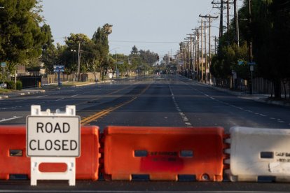 Roads remain closed after residents were evacuated following a chemical leak from a large storage tank that threatened nearby homes in Garden Grove, California, on May 24, 2026. Authorities in California on May 24 said they discovered a crack in a damaged tank of toxic chemicals, potentially relieving pressure as the threat of an explosion has forced tens of thousands of residents to evacuate. About 50,000 residents were ordered to leave their homes in the Garden Grove area of Orange County, southeast of Los Angeles, on Friday after the tank began to leak, sending fumes over a heavily populated area about five miles from Disneyland. (Photo by Blake Fagan / AFP)