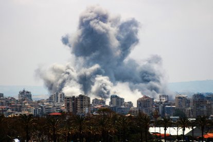 A plume of smoke rises following an Israeli airstrike on the outskirts of Tyre, southern Lebanon, on June 1, 2026. Iran's foreign ministry said on June 1 that a ceasefire in Lebanon remains a key condition for any deal with the United States to end the Middle East war. (Photo by KAWNAT HAJU / AFP)