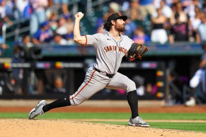 San Francisco Giants pitcher Ryan Walker (74) throws during the ninth inning of a baseball game against the New York Mets at Citi Field in Corona, N.Y., on August 3, 2025. (Photo by Gordon Donovan/NurPhoto) (Photo by Gordon Donovan / NurPhoto via AFP)