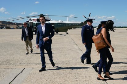 US Vice President JD Vance walks towards reporters after disembarking Marine Two at Joint Base Andrews, Maryland, on June 20, 2026. Vance will travel to Switzerland for talks with Iran, saying negotiations were going well. An Iranian negotiating team also left Iran for Switzerland on Saturday for discussions on the implementation of its agreement with the United States to halt the Mideast war, state media said. (Photo by Elizabeth Frantz / POOL / AFP)