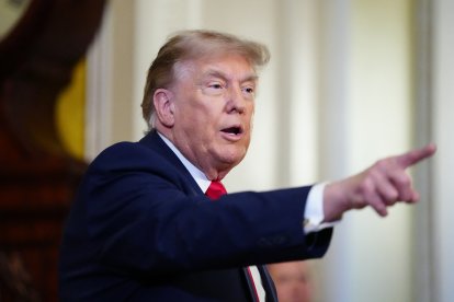US President Donald Trump speaks to the press after a lunch meeting with Senate Republicans at the US Capitol in Washington, DC, on June 24, 2026. President Trump said Wednesday he will refuse to sign a landmark housing bill, passed by Congress with broad bipartisan support, until lawmakers approve legislation that would overhaul American elections and restrict voter registration. (Photo by Aaron Schwartz / AFP)