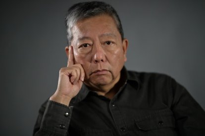 (FILES) Hong Kong pro-democracy activist Lee Cheuk-yan poses during a photo session in Hong Kong on March 21, 2021. Two activists who organised annual vigils marking China's deadly Tiananmen crackdown in 1989 were found guilty of "incitement to subversion", a Hong Kong court heard on August 21. (Photo by Peter PARKS / AFP)