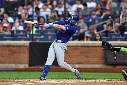 Los Angeles Dodgers player Kyle Tucker #23 hits a solo home run during the third inning of a baseball game against the New York Mets at Citi Field in Corona, New York, on July 25, 2026. (Photo by Gordon Donovan/NurPhoto) (Photo by Gordon Donovan / NurPhoto via AFP)