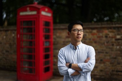In this picture taken on August 18, 2023, former Hong Kong legislator and pro-democracy activist Nathan Law poses for a photograph in London.
