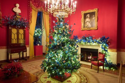 The White House Red Room with Christmas decorations.