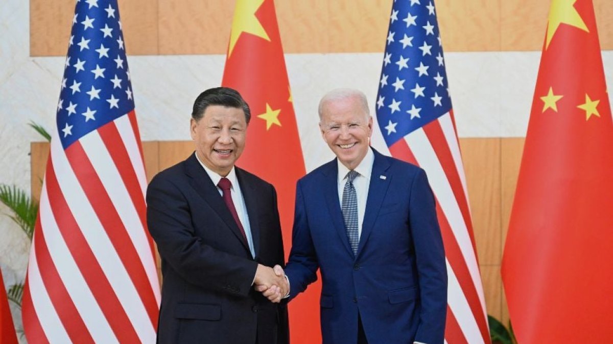 Xi Jinping con Joe Biden.