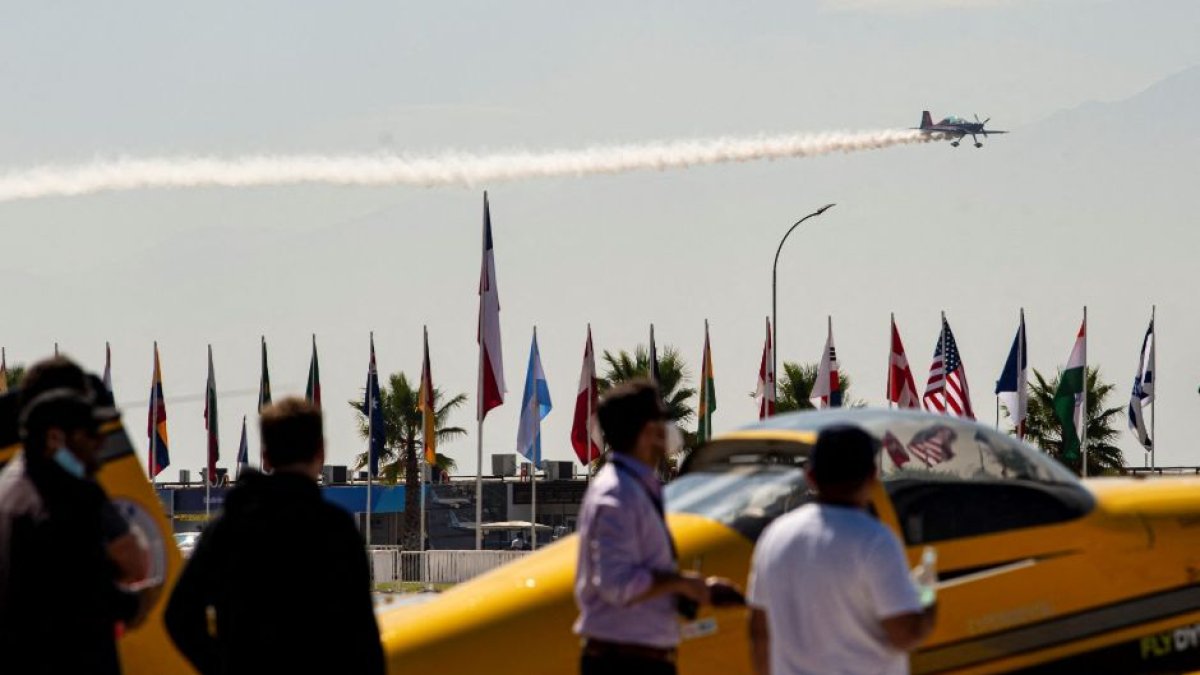 The Halcones (Hawks) group of the Chilean Air Force perform during the International Air and Space Fair (FIDAE) in Santiago