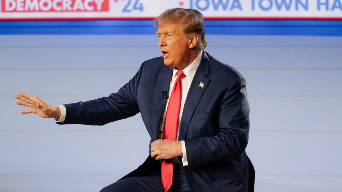 Former President Donald Trump gestures while speaking on stage during a Fox News Iowa Town Hall at the Iowa Events Center on January 10, 2024 in Des Moines, Iowa. (Photo by Jon Cherry/Sipa USA)