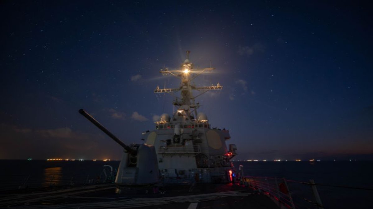 The Arleigh Burke-class guided-missile destroyer USS Carney (DDG 64) transits the Suez Canal, Oct. 18, 2023. Carney is deployed to the U.S. 5th Fleet area of operations to help ensure maritime security and stability in the Middle East region.