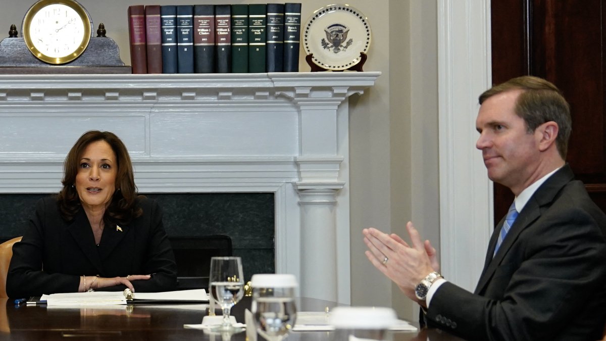 (FILES)  Kentucky Governor Andy Beshear (R) looks on as US Vice President Kamala Harris speaks during a roundtable conversation about marijuana reform and criminal justice reform, in the Roosevelt Room of the White House on March 15, 2024 in Washington, DC. - US President Joe Biden announced July 21, 2024 that he is dropping out of his reelection battle with Donald Trump, in a historic move that plunges the already turbulent 2024 White House race into uncharted territory. Biden's withdrawal from the race for the White House leaves a gap atop the Democratic presidential ticket that the party. (Photo by Kent Nishimura / AFP)