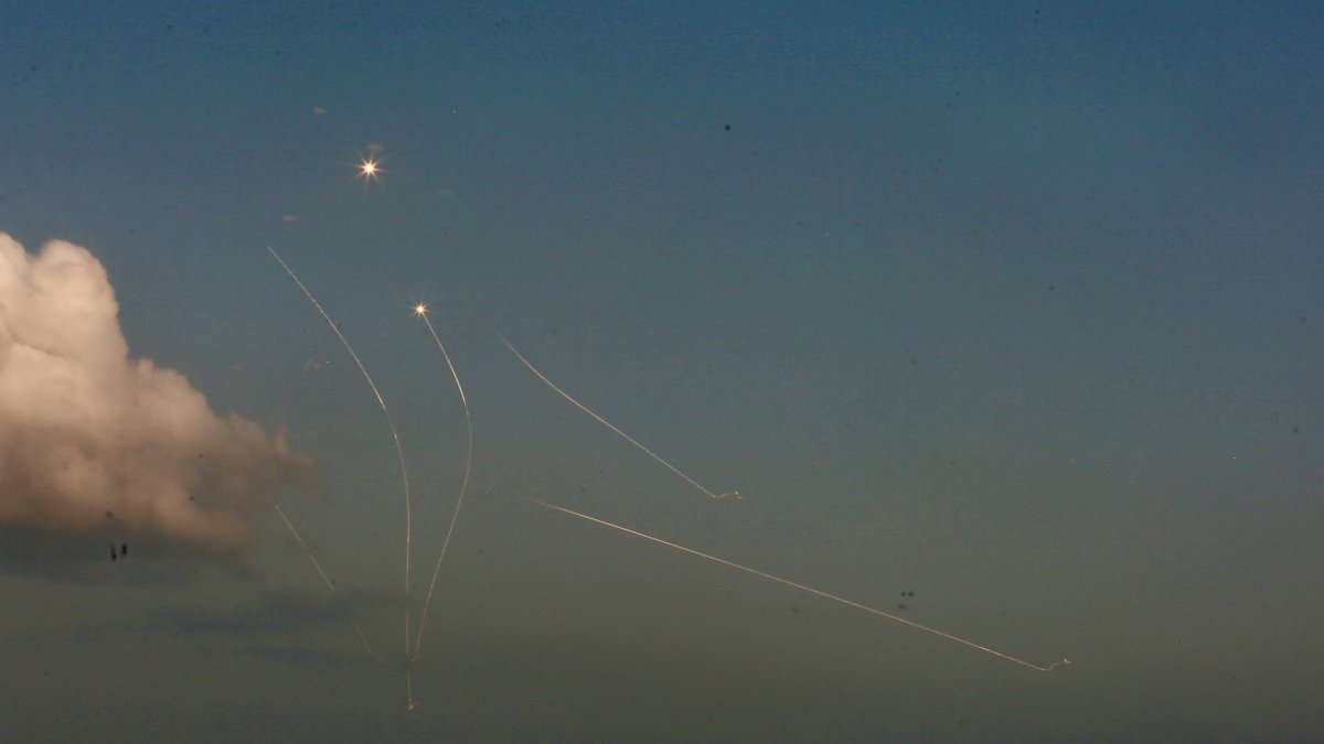 An Israeli aerial defense system launches missiles to intercept rockets fired from Lebanon