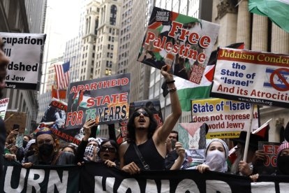 Demonstrators rally in the streets with flags chanting slogans in support op Palestinians in Gaza on October 26, in New York City USA.