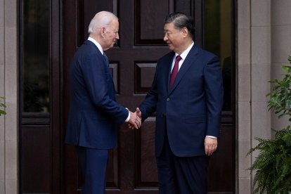 US President Joe Biden greets Chinese President Xi Jinping before a meeting during the Asia-Pacific Economic Cooperation (APEC) Leaders' week in Woodside, California on November 15, 2023. Biden and Xi will try to prevent the superpowers' rivalry spilling into conflict when they meet for the first time in a year at a high-stakes summit in San Francisco on Wednesday. With tensions soaring over issues including Taiwan, sanctions and trade, the leaders of the world's largest economies are expected to hold at least three hours of talks at the Filoli country estate on the city's outskirts. (Photo by Brendan Smialowski / AFP)