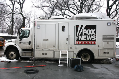 Vehicle with Fox News logo.