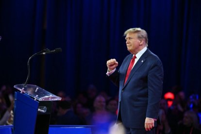 Former US President and 2024 presidential hopeful Donald Trump arrives to speak during the annual Conservative Political Action Conference (CPAC)