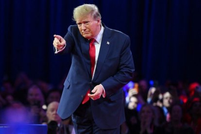 Former US President and 2024 presidential hopeful Donald Trump leaves after speaking at the annual Conservative Political Action Conference (CPAC) meeting on February 24, 2024, in National Harbor, Maryland. (Photo by Mandel NGAN / AFP)