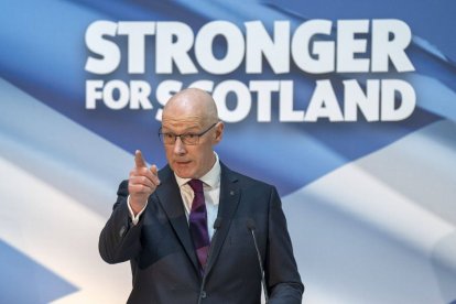 John Swinney durante una intervención.