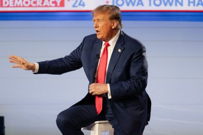 Former President Donald Trump gestures while speaking on stage during a Fox News Iowa Town Hall at the Iowa Events Center on January 10, 2024 in Des Moines, Iowa. (Photo by Jon Cherry/Sipa USA)