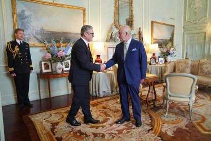 King Charles III welcomes Sir Keir Starmer during an audience at Buckingham Palace, London, where he invited the leader of the Labour Party to become Prime Minister and form a new government following the landslide General Election victory for the Labour Party. Picture date: Friday July 5, 2024.