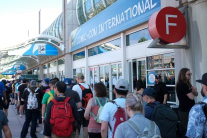 Attendees line up outside the San Diego Convention Center on the first day of Comic-Con International in San Diego, California, on July 24, 2024. (Photo by Chris DELMAS / AFP)