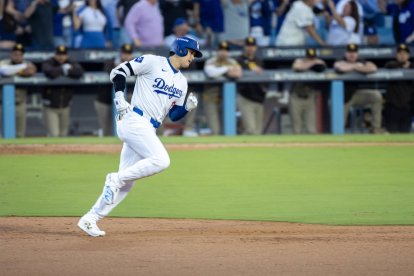 Shohei Othani scores a run.