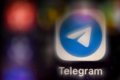 The logo of mobile messaging and calling service Telegram on the screen of a smartphone.