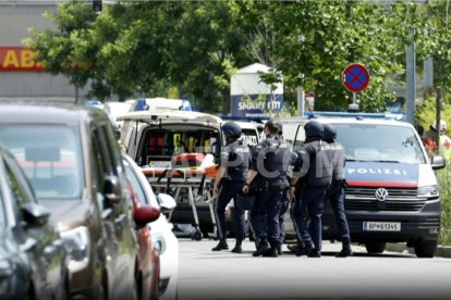 Austrian police officers at the scene.