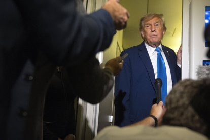 Trump speaks to reporters from Air Force One