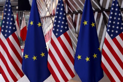 File image of the flags of the U.S. and the European Union.