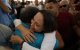 María Corina Machado se abraza con una seguidora tras regresar a Venezuela