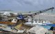 Damaged fishing boats rest on the shore after the passing of Hurricane Beryl at the Bridgetown Fish Market, Bridgetown, Barbados on July 1, 2024. (Photo by Randy Brooks / AFP)