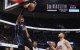 El pívot de los Orlando Magic Wendell Carter Jr. (34) hace un mate delante del escolta de los Cleveland Cavaliers Ty Jerome, a la derecha, en la segunda mitad de un partido de baloncesto de la NBA el domingo 16 de marzo de 2025, en Cleveland.