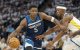 8 de mayo de 2025; Minneapolis, Minnesota, EE.UU.; El escolta de los Minnesota Timberwolves Anthony Edwards (5) regatea el balón ante el alero de los Golden State Warriors Jimmy Butler III (10) en la primera parte del segundo partido de la segunda ronda de los Playoffs de la NBA 2025 en el Target Center.