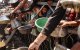 Palestinians crowd at a lentil soup distribution point in Gaza City in the northern Gaza Strip on July 27, 2025. (Photo by Omar AL-QATTAA / AFP)